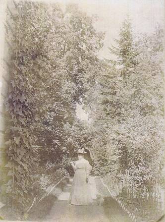 woman in mill house garden june 1901